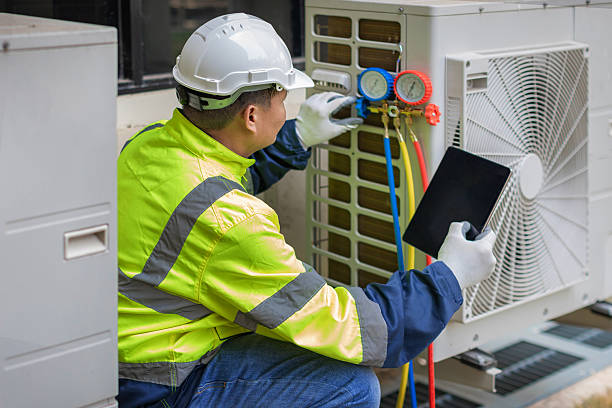 Professional Hvac technician working in Keezletown, VA